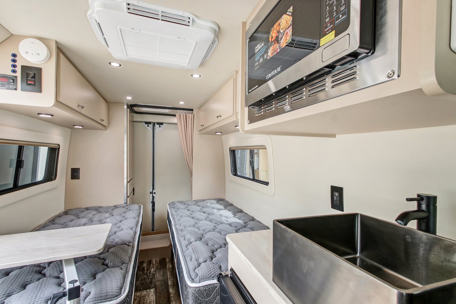 Custom Coach Creations | Custom Class B Van Conversions & RVs